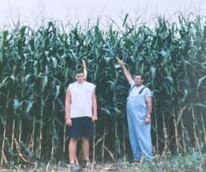 2 men with corn