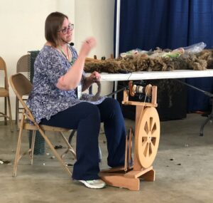 woman spinning wool