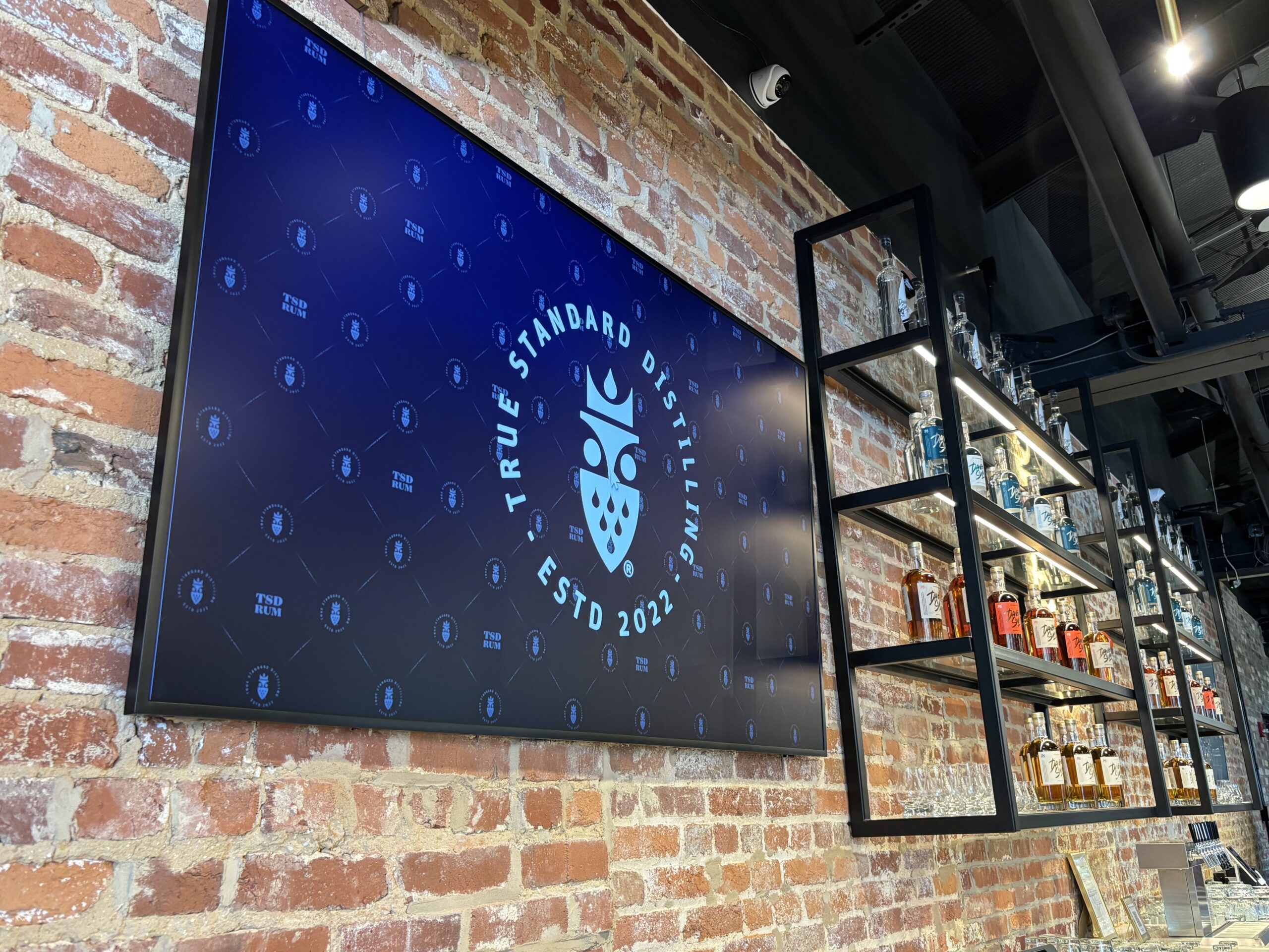 Red Brick wall and Distillery Product shelving