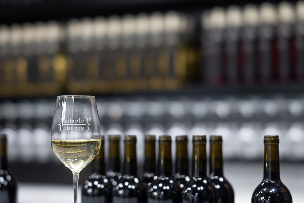 Wine glass and bottles