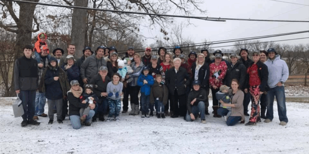 large family in the snow