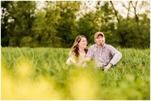 couple standing in a farm field