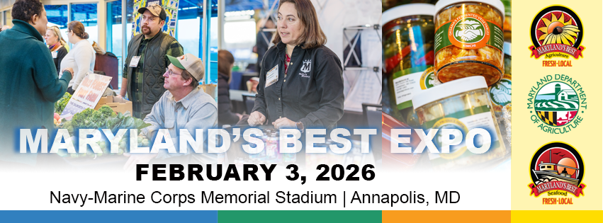 Trade show with folks standing at booths