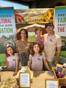 a family with a women and a man and three young girls