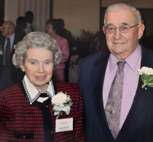 jane smith, a women and a man standing next to eachother