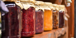 jars of jam stacked in a row